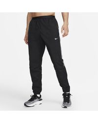nike swift men's running trousers
