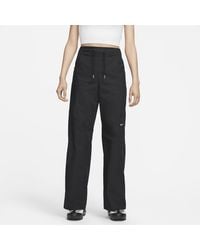 Nike - Pantaloni in tessuto a vita alta sportswear essentials - Lyst