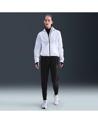 Nike - Swift Dri-Fit Mid-Rise Running Trousers - Lyst