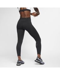 Nike Bra a sostegno medio con stampa Swoosh - Nero