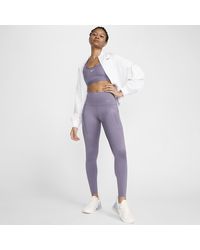 Nike - Go Lange legging Met Hoge Taille, Zakken En Complete Ondersteuning - Lyst
