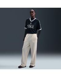 Nike - Sportswear Mid-Rise Loose Jacquard Striped Track Pants - Lyst