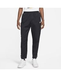 Nike - Pantaloni in tessuto sportswear repeat - Lyst