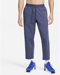 Nike - A.p.s. pantaloni versatili in tessuto dri-fit - Lyst