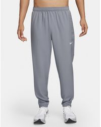 Nike - Challenger Dri-Fit Woven Running Pants - Lyst