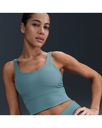 Nike - Zenvy Rib Lange Sport-Bh Met Vulling En Lichte Ondersteuning - Lyst