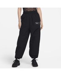 Nike - Sportswear Woven joggers Polyester - Lyst