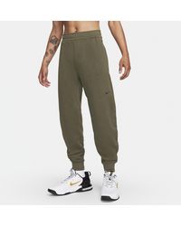 Nike - Pantaloni versatili a.p.s. therma-fit - Lyst