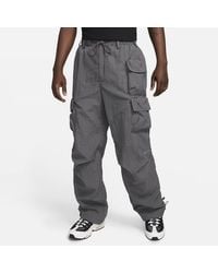Nike - Pantaloni con fodera in tessuto sportswear tech pack - Lyst
