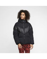piumino nike arancione