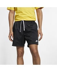 nike club essentials woven flow shorts pink