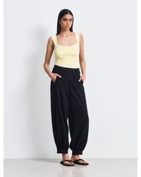 NINETY PERCENT - Lumi Smart Trouser In Black - Lyst