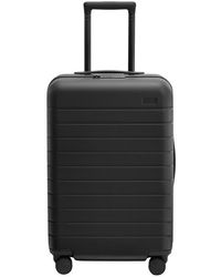 AWAY - The Bigger Carry-On Flex Suitcase - Lyst