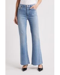 FRAME - The Icon Raw Hem Flare Jeans - Lyst
