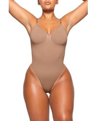 Skims - Seamless Sculpt Low Back Thong Bodysuit - Lyst