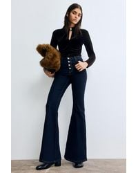 H&M - Flared High Jeans - Lyst