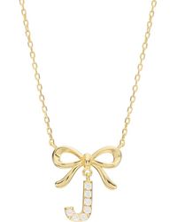 ATHRA LUXE - Cubic Zirconia Bow Initial Pendant Necklace - Lyst