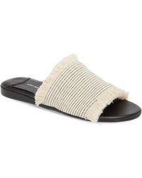womens black and gold nike slides