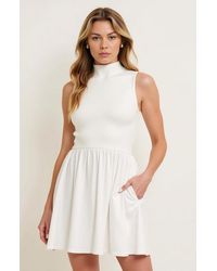 Modenaire - Mock Neck Sleeveless Mini Dress With Gathered Skirt And Pockets - Lyst