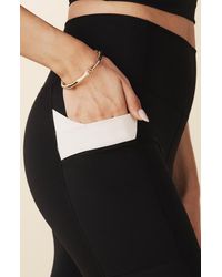 Losano - Criss-Cross Pocket Legging - Lyst