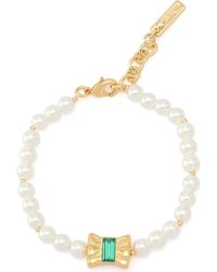 Kurt Geiger - Bow Charm Faux Pearl Bracelet - Lyst