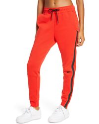 Nike Wide-leg and palazzo pants for Women - Up to 41% off at Lyst.com