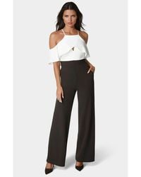 Bebe - Cold Shoulder Palazzo Leg Jumpsuit - Lyst