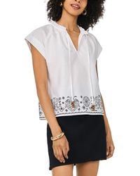 Vince Camuto - Ruffle Trim Split Neck Border Print Top - Lyst