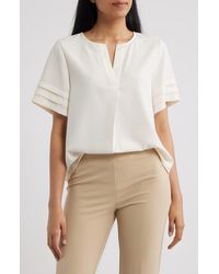 Anne Klein - Pleated Split Neck Top - Lyst
