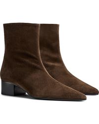 KHAITE - Andee Pointed Toe Bootie - Lyst