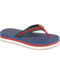 female gucci flip flops
