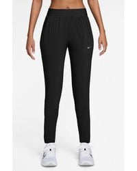 Nike - Swift Dri-Fit Mid Rise Running Pants - Lyst