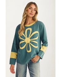Knit & Lounge - Bold Floral Applique Long Sleeve Relaxed Fit Top - Lyst
