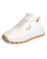 Prada - Leather Triangle Sneakers - Lyst
