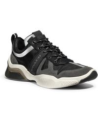 black coach tennis shoes