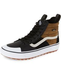 vans high top dorados