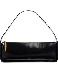 KHAITE - Lori Baguette Leather Shoulder Bag - Lyst