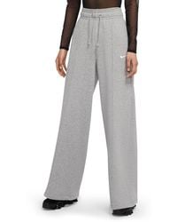 nike mini swoosh high waisted wide leg joggers in red