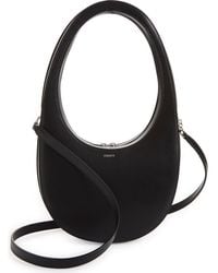 Coperni - Small Swipe Leather Crossbody Bag - Lyst