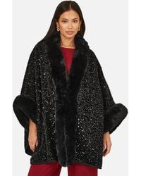 Yumi' - Textured Faux Fur Lined Cape - Lyst
