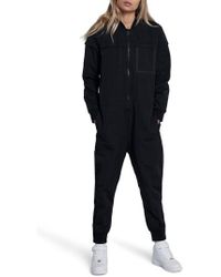 nike international jumpsuit