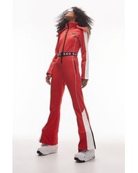 TOPSHOP - Hooded Belted Flare Leg Ski Suit With Faux Fur Trim - Lyst