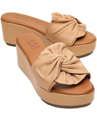 Forever & Always Shoes - Syndra Bow Wedge Leather Sandal - Lyst