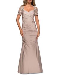 la femme lace top trumpet gown
