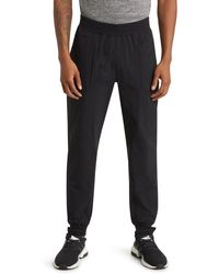 Alo Yoga - Co-op Performance joggers - Lyst