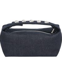 Apparis - Marfa Top Carry Handle Pouch - Lyst