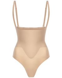 Commando - Zone Smoothing Open Bust Bodysuit - Lyst