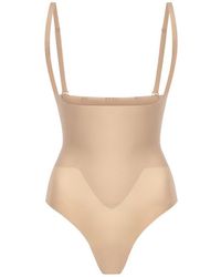 Commando - Zone Smoothing Open Bust Bodysuit - Lyst