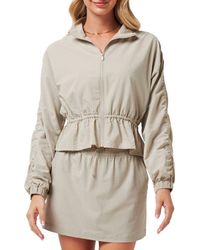 Travis Mathew - Timeless Breezeblend Peplum Jacket - Lyst