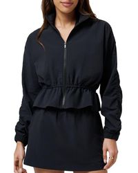 Travis Mathew - Timeless Breezeblend Peplum Jacket - Lyst